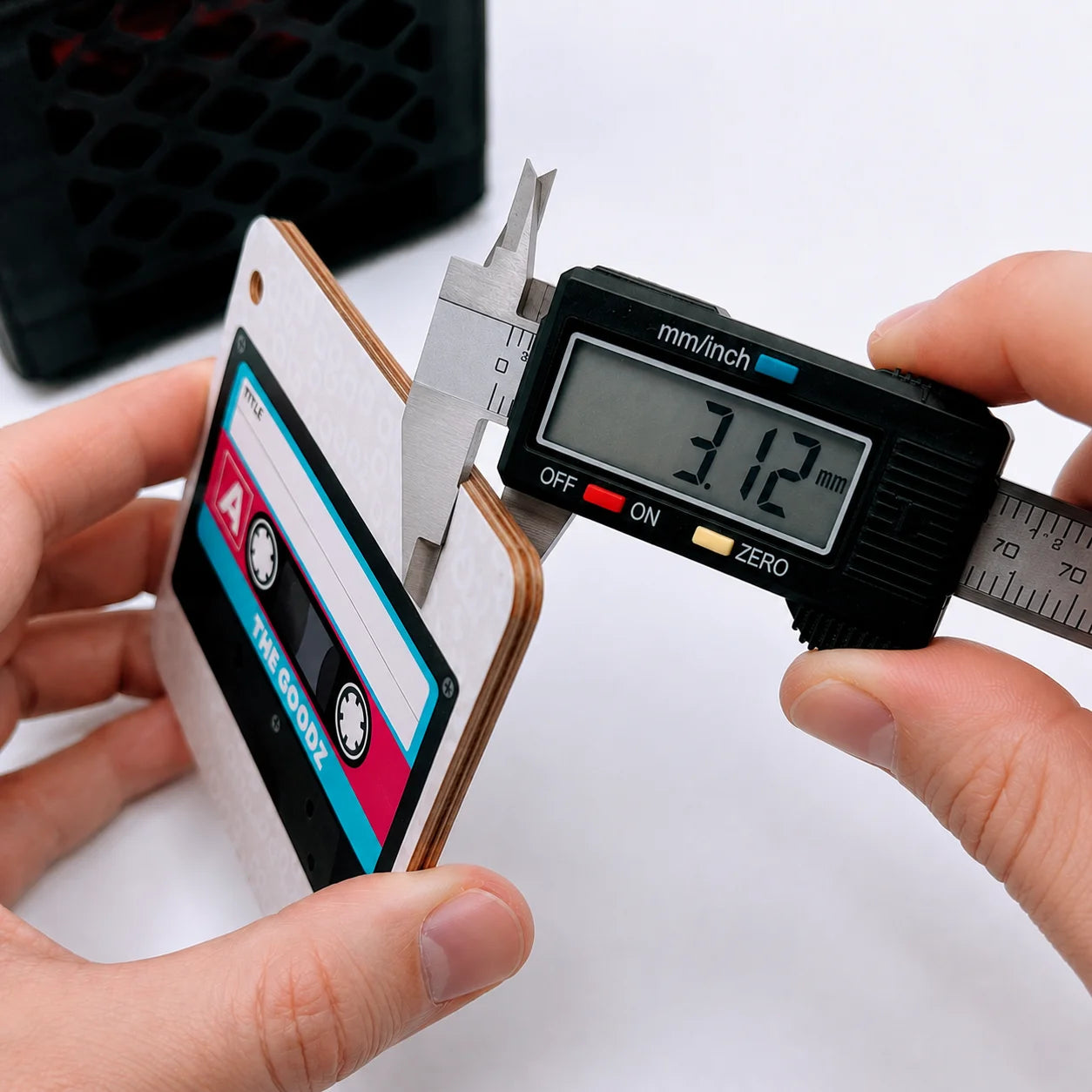 Custom Goodz card thickness shown with calipers